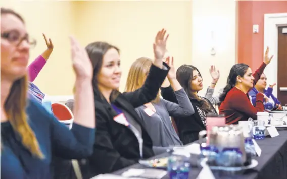  ?? Photos by Amy Osborne / Special to The Chronicle ?? Women interested in running for office respond to a question during a training for potential Democratic candidates held by Emily’s List in San Francisco.