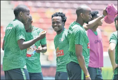  ??  ?? Percy Tau, centre, with his Bafana teammates during a training session at Peter Mokaba Stadium in Polokwane this week.