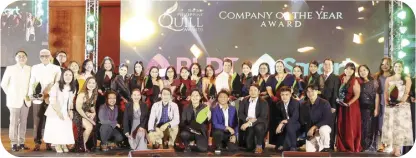  ?? ?? Members of PLDT and SMART come up the stage as they receive the Company of the Year award. PHOTOS BY JESSE BUSTOS AND IABC