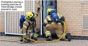  ??  ?? Firefighte­rs during a training exercise at Trent Bridge cricket ground in June