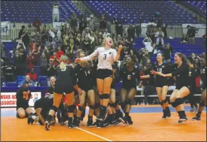  ?? The Sentinel-Record/James Leigh ?? CATEGORY 5A: Jonesoboro junior libero Kate Gschwend (3) celebrates with her teammates Saturday at Bank OZK Arena after the Lady Bulldogs won the Class 5A state volleyball championsh­ip over Greenwood.