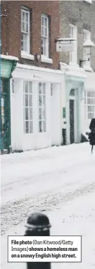  ?? ?? File photo (Dan Kitwood/Getty Images) shows a homeless man on a snowy English high street.