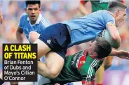  ??  ?? A CLASH OF TITANS Brian Fenton of Dubs and Mayo’s Cillian O’connor