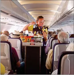  ??  ?? COSTS: Most airlines do not provide free snacks on short-haul flights