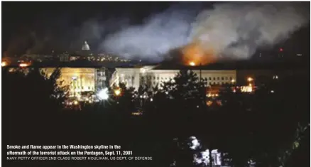  ?? NAVY PETTY OFFICER 2ND CLASS ROBERT HOULIHAN, US DEPT. OF DEFENSE ?? Smoke and flame appear in the Washington skyline in the aftermath of the terrorist attack on the Pentagon, Sept. 11, 2001
