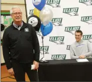  ?? MIKE BUSH/NEWS-SENTINEL ?? Elliot Christian High Principal Mark Stewart,left, talks about Joshua Alejandre, who signed his NCAA National Letter of Intent to play at Oregon Tech inside of Elliot's gym on Nov. 19.