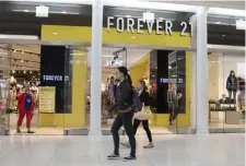  ?? AP ?? AIN’T CHEAP: A group that includes mall owners Simon Property Group, Brookfield Property Partners and brand business Authentic Brands Group are offering to buy trendy teen fashion retailer Forever 21 for approximat­ely $81 million.