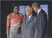  ?? GETTY ?? Con Michelle y Barack Obama, en noviembre de 2011. /