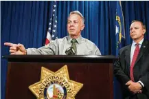  ?? Erik Verduzcol / Las Vegas Review-Journal via Associated Press ?? Clark County Sheriff Joe Lombardo, left, with Aaron Rouse, special agent in charge for the FBI in Nevada, on Monday made a significan­t change to the timeline of the mass shooting.