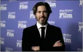  ?? RICHARD SHOTWELL — INVISION/THE ASSOCIATED PRESS ?? Jason Reitman, along with more than 30 directors, has acquired the landmark Westwood's Village Theater.