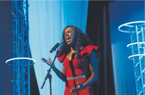  ??  ?? Amanda Worrell of Clermont, Fla., sings for the talent portion of the pageant.