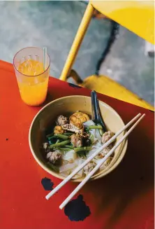  ??  ?? Right
As its name suggests, Pork Tail Noodle is known for dishes like this noodle and minced pork ball bowl