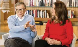  ?? TED S. WARREN / AP ?? Microsoft co-founder Bill Gates and his wife Melinda are rethinking their work in America as they confront what they consider an unsatisfac­tory track record, the country’s growing inequity and a president they disagree with.