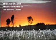  ??  ?? The Field of Light installati­on adds to the aura of Uluru.