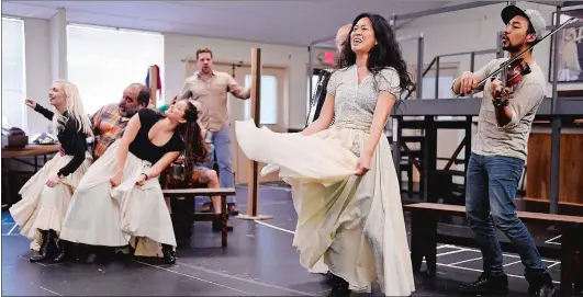  ?? SEAN D. ELLIOT/THE DAY ?? EJ Zimmerman, who plays the character of Nancy, second from right, and the cast of the Goodspeed production of “Oliver!” rehearse “Oom-Pah-Pah.”