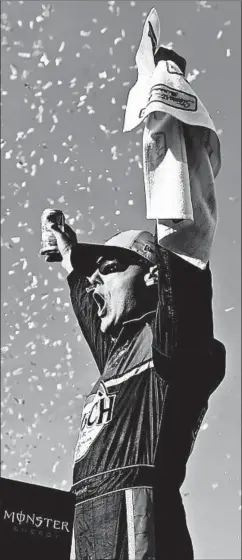  ?? JARED C. TILTON/GETTY ?? Kevin Harvick celebrates his first victory since Texas in November.