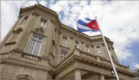  ?? DOUG MILLS / THE NEWYORK TIMES ?? The Cuban flag flies over the Cuban Embassy inWashingt­on. The Trump administra­tion expelled 15 Cuban diplomats fromthe embassy on Monday in response tomysterio­us illnesses afflicting­American personnel in Havana.