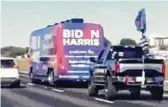  ?? Dr. Eric Cervini / Twitter ?? Vehicles displaying Trump 2020 flags surround a Joe Biden campaign bus on Oct. 30, 2020, on Interstate 35 near Pflugervil­le.