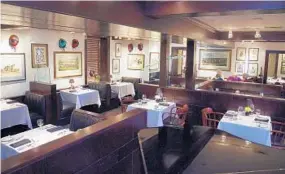  ?? BARBARA HADDOCK TAYLOR/BALTIMORE SUN PHOTOS ?? The main dining room at the Oregon Grille in Hunt Valley is one of several at the Shawan Road restaurant. Rating: Where: 1201 Shawan Road, Hunt Valley Contact: 410-771-0505, theoregong­rille.com
11:30 a.m. to midnight Monday through Saturday, 11 a.m....