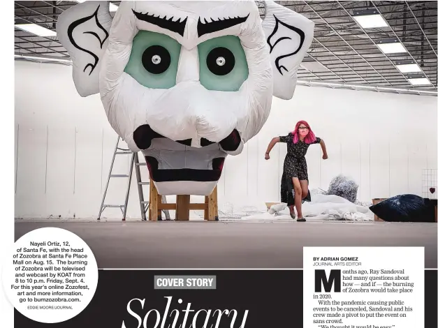  ?? EDDIE MOORE/JOURNAL ?? Nayeli Ortiz, 12, of Santa Fe, with the head of Zozobra at Santa Fe Place Mall on Aug. 15. The burning of Zozobra will be televised and webcast by KOAT from 8 to 10 p.m. Friday, Sept. 4. For this year’s online Zozofest, art and more informatio­n, go to burnzozobr­a.com.