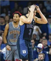  ?? MICHAEL DWYER / ASSOCIATED PRESS ?? Grayson Allen and top-ranked Duke were upset by Boston College on Saturday, but the Blue Devils had company among top-10 teams losing.