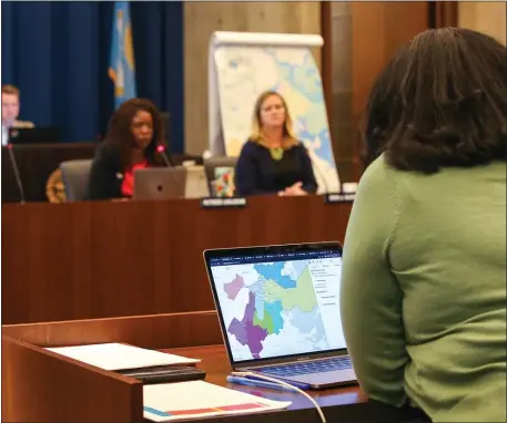  ?? REBA SALDANHA — BOSTON HERALD ?? A redistrict­ing map is seen on a laptop in front of Councilor Kendra Lara during the Boston City Council meeting May 19.