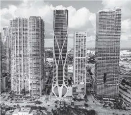  ?? PEDRO PORTAL Mami Herald, file 2019 ?? View of the One Thousand Museum (third from right), high-rise residentia­l condominiu­m located at 1000 Biscayne Boulevard in Miami, as seen in 2019.