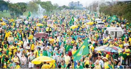  ?? — AFP photo ?? Supporters of Bolsonaro take part in a demonstrat­ion against the results of the runoff election, in front of the Army headquarte­rs in Brasilia.