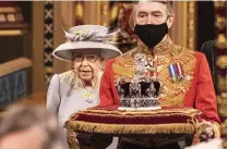  ?? PICTURE: PA ?? Jewel in crown: Queen walks through parliament’s royal gallery yesterday