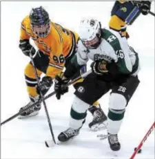  ?? DIGITAL FIRST MEDIA FILE ?? Ridley’s Nate Dunning, right, took on Springfiel­d’s Joseph Cavaliere, left, in a closely contested Central division title game last March at Ice Works. Both players will return Monday with their teams as the Central playoffs kick off. Ridley will be...