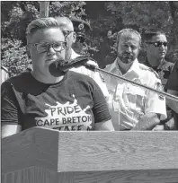  ?? NANCY KING/CAPE BRETON POST ?? Amy MacNeil, co-chair of Pride Cape Breton, was among the speakers Friday during an event kicking off the CBRM’s 17th annual Pride festival, flanked by fellow Pride Cape Breton board members and officials from the CBRM, fire, police, Canadian Coast Guard and sheriff services.