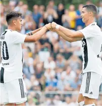  ?? AP ?? Paulo Dybala and Cristiano Ronaldo of Juventus. —