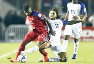  ??  ?? USA midfielder Jermaine Jones tackles Panama’s Armando Cooper in their 2018 World Cup qualifier in Panama City on March 2.