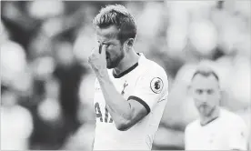  ?? ASSOCIATED PRESS FILE PHOTO ?? Harry Kane reacts after missing an opportunit­y to score against Newcastle United at Tottenham Hotspur Stadium in London on Sunday.