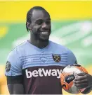  ??  ?? ■ Michail Antonio with the match ball