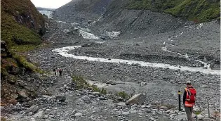  ?? PHOTO: IAN FULLER ?? Fox Glacier in 2014. News Zealand’s shrinking glaciers are a sign of a warming climate.