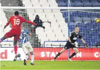  ??  ?? FLYING HIGH
Reading’s Lucas Joao scores his second goal