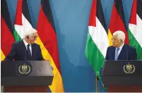  ??  ?? GERMAN PRESIDENT Frank-Walter Steinmeier (left) and Palestinia­n Authority President Mahmoud Abbas hold a joint press conference in Ramallah yesterday.