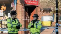  ?? PHOTO: GETTY IMAGES ?? British police guard the area where Sergei Skripal and daughter Yulia were found critically ill in Salisbury last month.