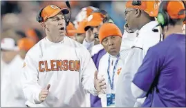  ?? ASSOCIATED PRESS] [BOB LEVERONE/THE ?? Lineman Jackson Carman said Clemson coach Dabo Swinney told him Urban Meyer “was on the back half of his career.”