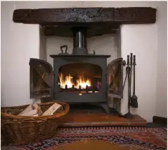  ?? ?? Heating rural newbuilds with woodburnin­g stoves could result in lower emissions than using heat pumps, one expert believes