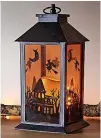  ?? ?? Haunted house outdoor Halloween lantern, £18.99, Lights4fun