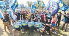  ?? Picture: RICHARD GOSLING ?? About 200 Gold Coast City Council workers rallied for better pay conditions yesterday.