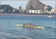  ?? PHOTO COURTESY OF SARAH NASE ?? Robin Prendes, Anthony Fahden, Edward King and Tyler Nase compete in the Menás coxless lightweigh­t four Final B during the 2016 Rio Olympics. The race is taking place in the Lagoa Rodrigo de Freitas in Rio de Janerio, Brazil.