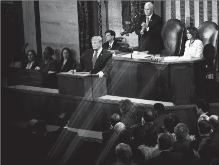  ?? TOM BRENNER / THE NEW YORK TIMES ?? President Donald Trump delivers his State of the Union address Monday in the House Chamber of the Capitol. Casting socialism as a threat could become the kind of rhetorical touchstone of Trump’s re-election campaign that sounding the alarm about “criminal illegal aliens” was in 2016.