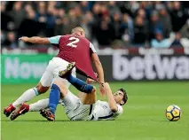  ?? PHOTOS: GETTY IMAGES ?? Winston Reid of West Ham United and Alvaro Morata of Chelsea battle for possession in West Ham’s 1-0 win.