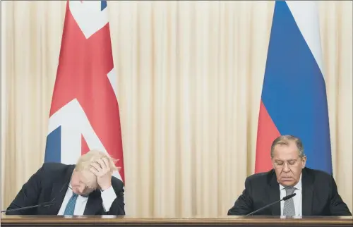  ??  ?? Foreign Secretary Boris Johnson and his Russian counterpar­t Sergei Lavrov during a press conference following their meeting in Moscow.