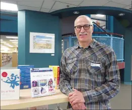  ?? NEWS PHOTO GILLIAN SLADE ?? Kim Swanson, the new CAO for Cypress View Foundation, poses for a photograph in Medicine Hat Public Library.