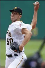  ??  ?? Pittsburgh Pirates starting pitcher Jameson Taillon delivers in the first inning of a baseball game against the Chicago White Sox in Pittsburgh, on Wednesday. AP PHOTO/GENE J. PUSKAR