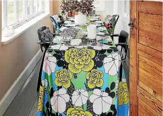  ?? BOLT OF CLOTH WALLACE COTTON ?? A colourful tablecloth means you don’t have to go all out on a lavish centerpiec­e, says Suzannah Tonascia from Bolt of Cloth. Paula Wallace from Wallace Cotton prefers the relaxed linen look.